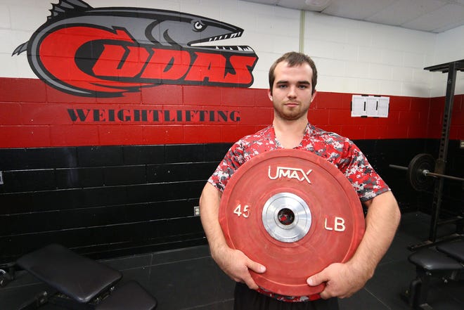 New Smyrna Beach's Cody Wilson tied the school record in the clean and jerk (320 pounds) and won a state title in the 169-pound division.