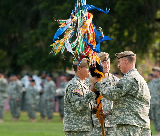 Corey Dickstein/Savannah Morning News                                             Leaders of the Army's Savannah-based 1st Battalion, 75th Ranger Regiment Thursday evening pass by their Rangers as they review the formation at Forsyth Park during a change of command ceremony. Pictured, from to left to right, are incoming battalion commander Lt. Col. Brandon Tegtmeier, battalion executive officer Maj. Robert Shaw, and outgoing battalion commander Col. Robert Harman. Harman relinuished command of the special operations unit during the ceremony after leading for the last two years.