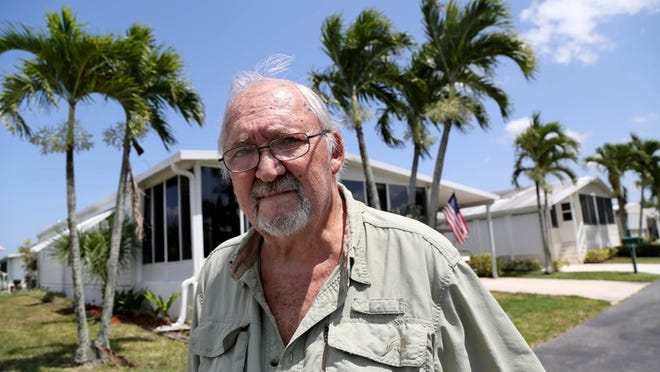 Retiree Don Raphael outside his manufactured home in Jamaica Bay in Boynton Beach. Citizens sent him a letter canceling his policy.