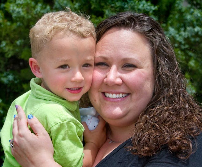 Kendra Slater, of Topeka, and her 2-year-old son, P.J. Slater, have an extremely close relationship. Kendra Slater battled postpartum depression after the birth of P.J. Slater's husband, Phil, played a big role in Slater's survival, she said.