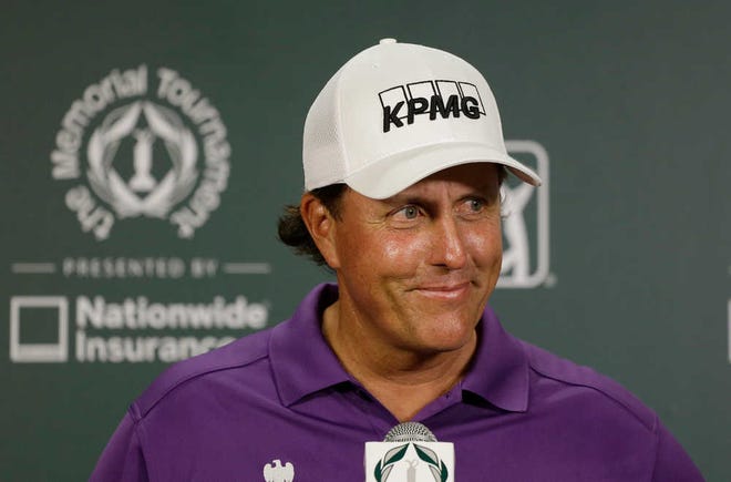 Phil Mickelson listens to a question during a news conference following the third round of the Memorial golf tournament on Saturday.