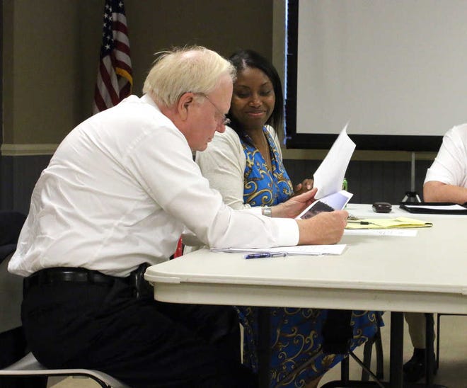 Amanda Dickey/Hardeeville Today Interim city attorney Tom Johnson shares documents with finance cirector Chanel Lewis presented at a city workshop May 22.