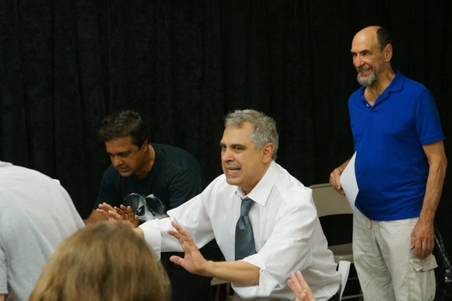 Ron Song Destro, center, leads an acting exercise as Academy Award-winning actor F. Murray Abraham, right, looks on.
