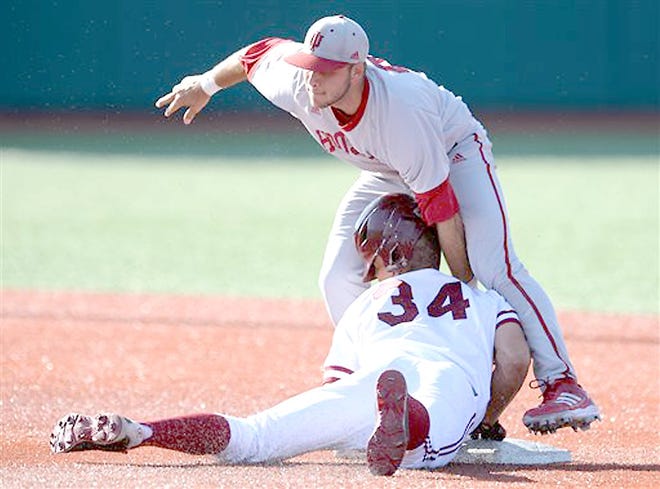 Stanford's Dominic Jose (34) is out on the tag by Indiana second baseman Casey Rodrigue during Saturday's regional game in Bloomington, Ind.



AP Photo/Chris Howell, The Herald Times