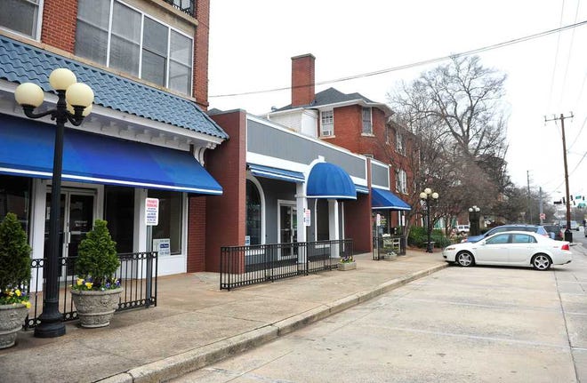 A row of parking spots along Lumpkin Street in the Five Points neighborhood remain empty in Athens, Ga. on Tuesday, Jan 8, 2013. (Richard Hamm/Staff)