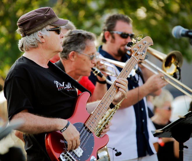 Zoom City performs during a free concert presented by Allied Arts to thank people for supporting the nonprofit’s recent fundraising campaign. The concert was at Bicentennial Park. Photo by Doug Hoke, The Oklahoman
 DOUG HOKE - 
THE OKLAHOMAN