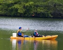 Invasive weeds made it difficult for kayakers to traverse Jacob's Pond.