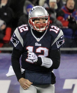 Tom Brady expresses his frustration during a Nov. 24 game against Denver. Brady and his young receiving corps weren't always on the same page last season.
