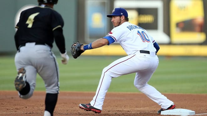 Express 1st baseman J. P. Arencibia guards the bag for a force out against the Omaha’s Christian Colon at Dell Diamond on Monday, June 2, 2014. Jamie Harms / for Round Rock Leader