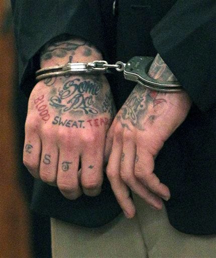 Murder Defendants Tattoos Covered for Trial  The New York Times