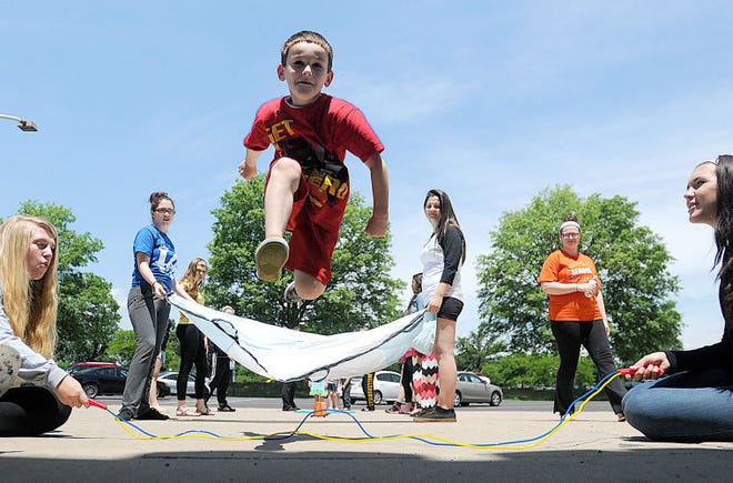 Bruce Marcucci takes a leap over a jumprope during a short obstacle course created by Bensalem High School students who are part of the preschool program during their class on Wednesday afternoon. The program, which is currently accepting registrations for the fall, is offered to kids who live in the district for a session Monday, Wednesday and Friday in a morning and afternoon session. The students who participate receive credit for a child development class in the family and consumer sciences department with teacher Jerilyn Bowler.