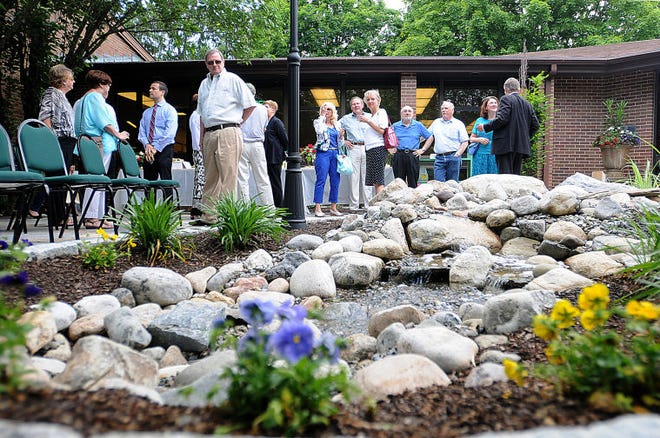 The Langhorne Branch of the Bucks County Free Library dedicates a new memorial garden after Rita Cummins Sappenfield, a library patron and donor, during a ceremony held in the garden Wednesday afternoon.