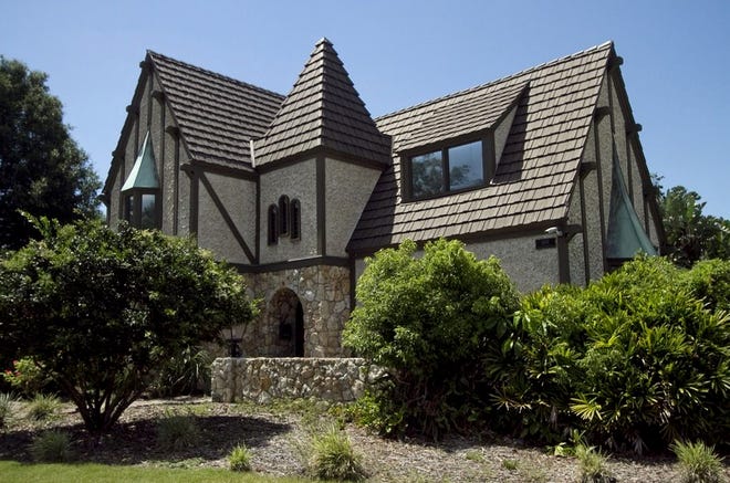 Tom Mims has purchased the old Tudor-style home at 1068 Lake Hollingsworth Drive and plans to raze the structure and rebuild it using some artifacts and materials salvaged from the historic structure.