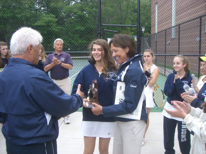 Swampscott captain Jessica Zolott and head coach Nina Rogers accept the Division 3 North runner-up trophy at Newton North High School on June 4. Wicked Local Photo / Joshua Boyd
