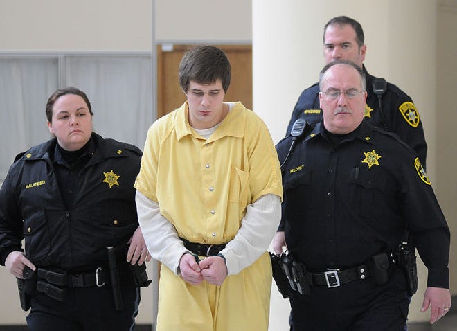 (FILE PHOTO) Dale Wakefield walks out of his arraignment at the Bucks County Courthouse in February on murder charges in connection with the stabbing death of a homeless man at the Doylestown train station last summer.