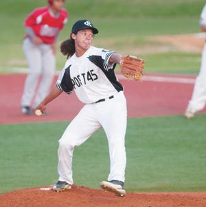 Post 45's Tristan Marsh comes on in relief against Martinsville. (PAUL CHURCH / THE COURIER-TRIBUNE)