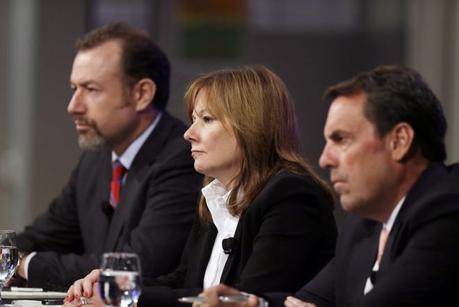 General Motors President Dan Ammann, left, CEO Mary Barra, and Executive Vice President Mark Reuss, hold a news conference at the General Motors Technical Center in Warren, Mich., Thursday, June 5, 2014. Barra said 15 employees ó many of them senior legal and engineering executives ó have been forced out of the company for failing to disclose a defect with ignition switches, which the company links to 13 deaths. Five other employees have been disciplined. THE ASSOCIATED PRESS