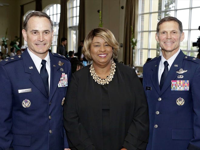 From left, Maj. Gen. H.D. Polumbo, Jr., commander, Ninth Air Force, Air Combat Command, Shaw Air Force Base, S.C.; Barbara Harrison, a retired medical executive with Lakeland Regional Health Systems; and Brig. Gen. Robert N. Polumbo, Mobilization Assistant to the Commander of the 12th Air Force, Air Combat Command, and commander, Air Forces Southern, U.S. Southern Command, Davis-Monthan Air Force Base, Arizona, are the 2014 inductees into the Polk County Public Schools Hall of Fame during the ceremony at the Lake Ashton Country Club near Winter Haven on Friday.