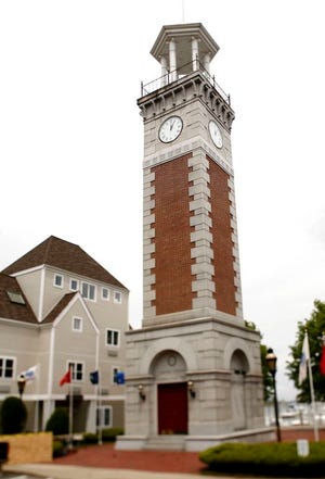 The Vietnam Veterans Memorial Clock Tower at the center of the marina boardwalk.
Marina Bay in the Squantum section of Quincy is a community unto itself. The area features townhouses, high rise apartment and condos as well as many restaurants and retail shops as well as professional office space surrounding a boat marina within eyesight of Boston.