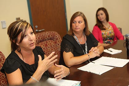 Carolina Forest Elementary School second grade teacher Tiffany Ellis, teacher assistant Michelle Bailey and principal Helen Gross speak Tuesday during roundtable discussion about North Carolina legislation which could affect teacher assistants.