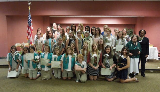 Pictured: Girls and staff and volunteers with the Girl Scouts of Historic Georgia pose for a photo following a ceremony May 4 at Jackson EMC to honor Girl Scouts who earned Gold, Silver, Bronze and Volunteer Awards. Girls that earned these awards have completed projects and activities that put the Girl Scout Promise and Law into action. The Girl Scout Bronze Award is the highest award Girl Scout Juniors (grades 4-5) are eligible for. The Silver Award is the highest award Girl Scout Cadettes (grade 6-8) are eligible to earn and Girl Scout Gold Award go to Girl Scout Seniors and Ambassadors. This is the highest award for girls in grades 9-12.