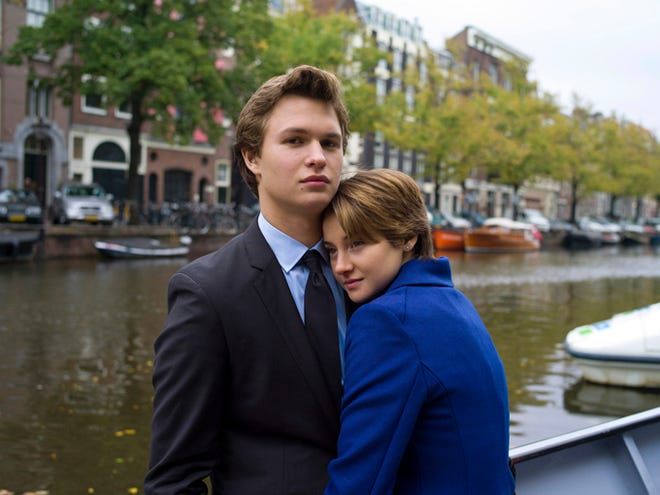 This image released by 20th Century Fox shows Ansel Elgort, left, and Shailene Woodley appear in a scene from "The Fault In Our Stars."