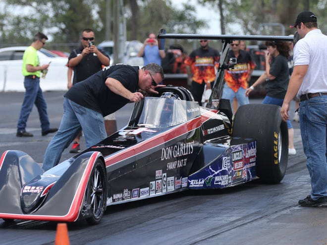 "Big Daddy" Don Garlits is backed out of his initial second run attempt because of a problem with the SR-37 "Swamp Rat 37" electric dragster at Bradenton Motorsports Park in Bradenton, Fla. on Sunday, June 8, 2014.