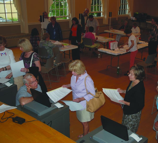 Voter turnout has been steady at Kennebunk Town Hall.
