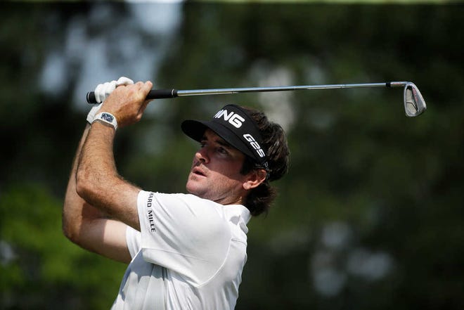 Bubba Watson watches his tee shot on the 15th hole during a practice round for the U.S. Open golf tournament in Pinehurst, N.C., Wednesday, June 11, 2014. The tournament starts Thursday. (AP Photo/David Goldman)