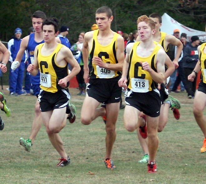 Corning runners, from left, John McCarthy, Sam Chauvin and Tom Moshier are shown competing at the NYSPHSAA state cross country meet. The Leader files