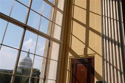 In this June 9, 2014, photo, the Capitol is seen from the Cannon House Office Building in Washington. Political polarization in America has broken out of the voting booth.