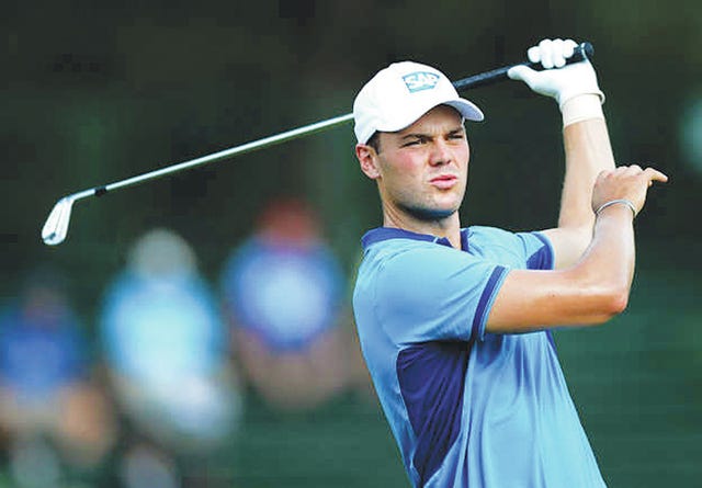 IN THE LEAD — Martin Kaymer watches his shot from the 13th tee box during first-round action of the U.S. Open on Thursday at Pinehurst No. 2. Kaymer finished the round as the leader at 5-under.