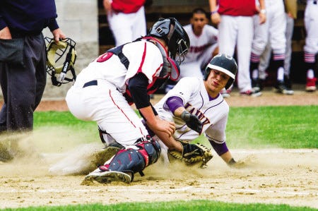 Cody Smith photo
Marshwood High School's Zack Quintal slides safely into home plate against Scarborough catcher Ben Irish during Thursday's Western Maine Class A baseball quarterfinal in South Berwick, Maine. The Hawks advanced to Saturday's regional semifinals with a 4-1 victory.