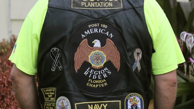 Robert “Pitstop” Thompson, assistant director of Chapter 180 of the American Legion Riders, shows off the American Legion Riders vest that led to a dispute Saturday at the Old Key Lime House in Lantana. A deal reached Thursday will have the restaurant and the American Legion raise money for veterans charities.