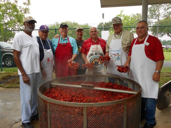 Pictured with the 1,200 pounds of crawfish boiled for Dow Retiree Club members on May 14 at the Dow Plantation Grounds in Plaquemine are from left: Leroy Pugh, Robbie Robbins, Tommy LeBlanc, Bubbie LeBlanc, Art Bourg, Jim Cox, and Mickey Hunt. Cox directed the boiling operation and sponsors for the event were Burns Estate Planning of Hammond and Allianz Life Insurance Company of North America.