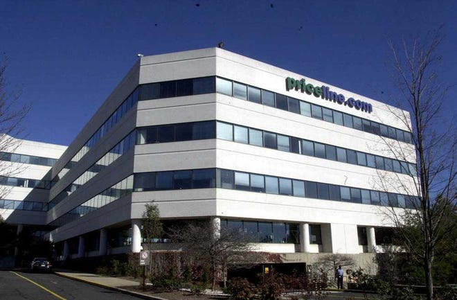 FILE - In this Thursday, Nov. 2, 2000, file photo, Priceline.com headquarters is shown, in Norwalk, Conn. Priceline is buying online restaurant reservation company OpenTable for $2.6 billion. The deal should help Priceline, the online travel company, branch out into a new business segment. (AP Photo/Douglas Healey, File)