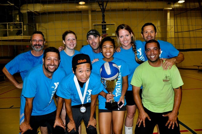 Team Wilkie was undefeated to claim the co-ed volleyball title at Southeast Volusia Family YMCA in Edgewater. Team members are (front from left) Robert Wilkie, Gary Mattson, Harintsoa Ranaivomampianina, David Wilkie; (back) Christophe Cardot, Theresa Catalo, Kevin Newport, Tonja Heer and Marcus Korndoerfer. Tom Mowrey was missing for the picture.