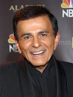 In this Oct. 27, 2003 file photo, Casey Kasem poses for photographers after receiving the Radio Icon award during The 2003 Radio Music Awards at the Aladdin Resort and Casino in Las Vegas. Kasem, the smooth-voiced radio broadcaster who became the king of the top 40 countdown, died Sunday, June 15, 2014, according to Danny Deraney, publicist for Kasem's daughter, Kerri. He was 82.
