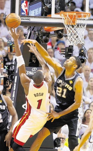 Spurs' Tim Duncan, right, may be closing in on 40, but he doesn't sound like he's ready to hang 'em up just yet.