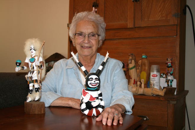 Darlene Wirtz learned wood carving with her husband, Frank, whom she married in 1983. She is pictured wtih a few of her many pieces.