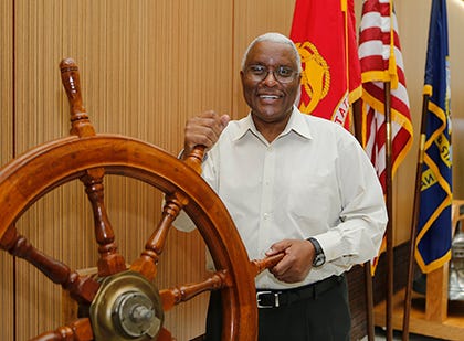 Raymond Applewhite with a ship’s wheel in the quarterdeck of Naval Hospital Camp Lejeune on Friday morning.