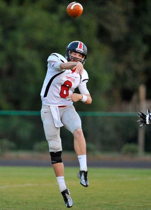 Jackson County's Jacob Lewis (6) throws a pass as Jackson County takes on Athens Christian on Friday, Sept. 13, 2013, in Athens, Ga. (Richard Hamm/Staff) OnlineAthens / Athens Banner-Herald