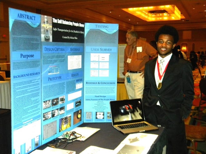 Adrian Niles is shown at the 2013 Afro-Academic Cultural Technological Scientific Olympics National Competition in Orlando, Fla.