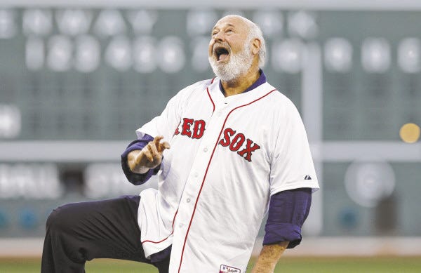Rob Reiner likes his throw on the ceremonial first pitch before Monday night's game between the Boston Red Sox and the Minnesota Twins at Fenway Park.