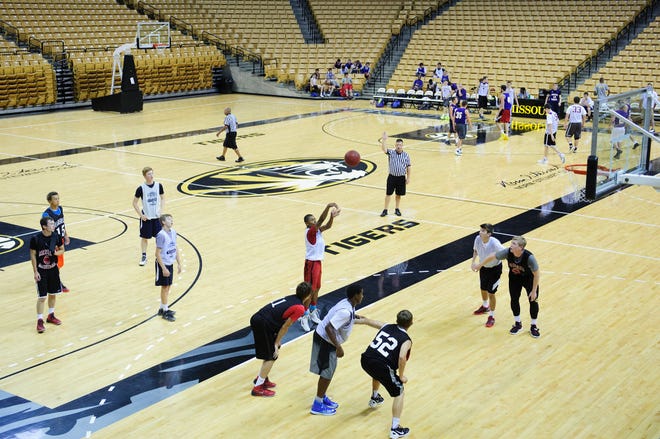 High school basketball teams play games Tuesday on the third day of the Missouri Tiger Team Camp at Mizzou Arena.