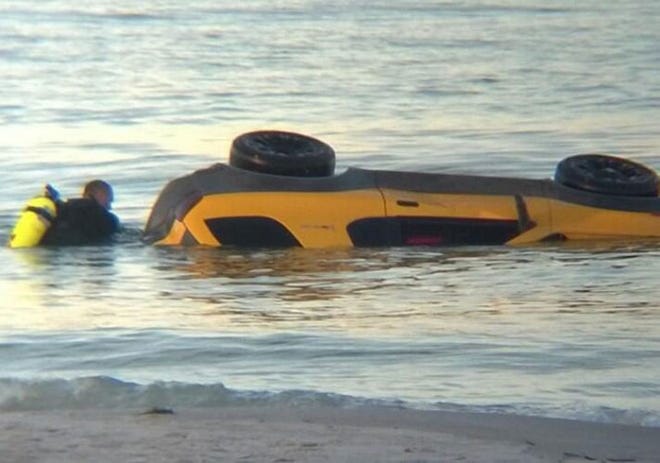 Rescue crews were looking for people in the water early Wednesday morning after a vehicle was reported in gulf waters near John's Pass. ( Bay News 9 photo )