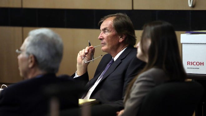 Glenn Straub, center, longtime owner of Palm Beach Polo, listens to his attorney Craig Galle give opening arguments in a trial involving homeowners of the Palm Beach Polo and Country Club trying to remove Galle from running the holding company at the Palm Beach County Courthouse in West Palm Beach, Fla., Tuesday, February 5, 2013. (Gary Coronado/The Palm Beach Post)