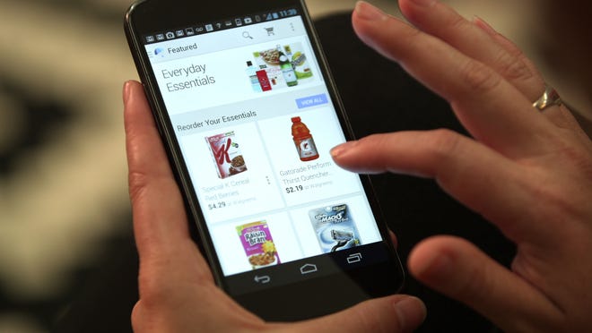 This undated product image provided by Google shows the Google Shopping Express mobile app. Same-day grocery delivery services from Google, Instacart and Postmates are expanding into more cities around the country, delivering everything from cereal to bottled water to toilet paper from nearby stores.