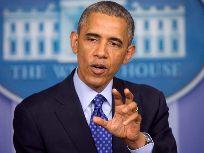 President Barack Obama speaks about the situation in Iraq on Thursday in the Brady Press Briefing Room of the White House in Washington. Obama said the US will send up to 300 military advisers to Iraq, set up joint operation centers.