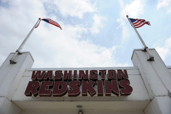 The U.S. Patent Office ruled Wednesday that the Washington Redskins nickname is "disparaging of Native Americans" and that the team's federal trademarks for the name must be canceled.